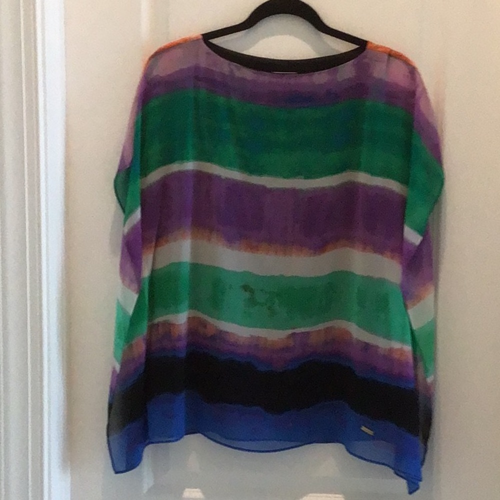 Sleeveless blouse from Calvin Klein.